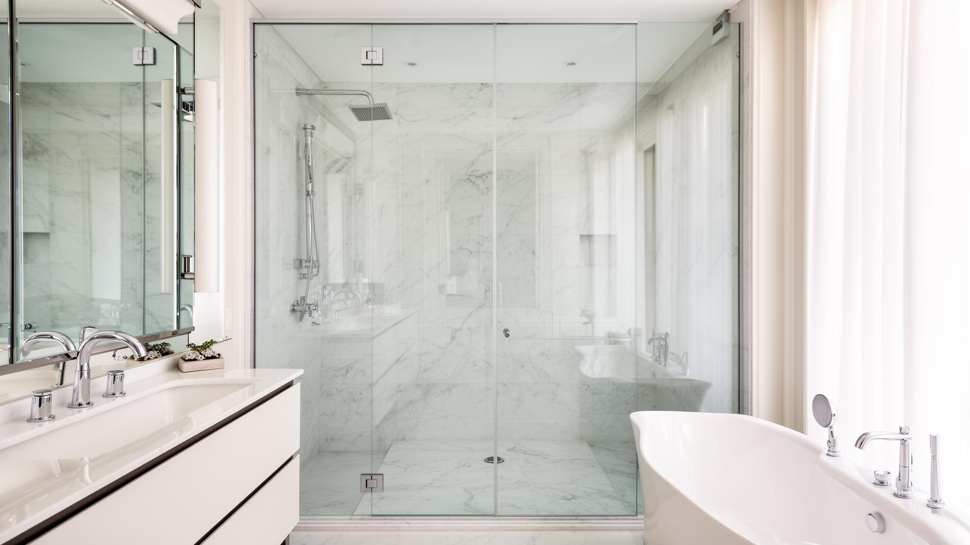 Premium frameless glass shower enclosure installation by Baum Glass & Mirror